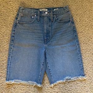 Madewell high-rise mid length denim shorts.
